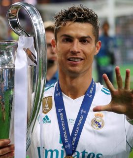 Soccer Football - Champions League Final - Real Madrid v Liverpool - NSC Olympic Stadium, Kiev, Ukraine - May 26, 2018   Real Madrid's Cristiano Ronaldo gestures as he celebrates winning the Champions League with the trophy   REUTERS/Hannah McKay     TPX IMAGES OF THE DAY